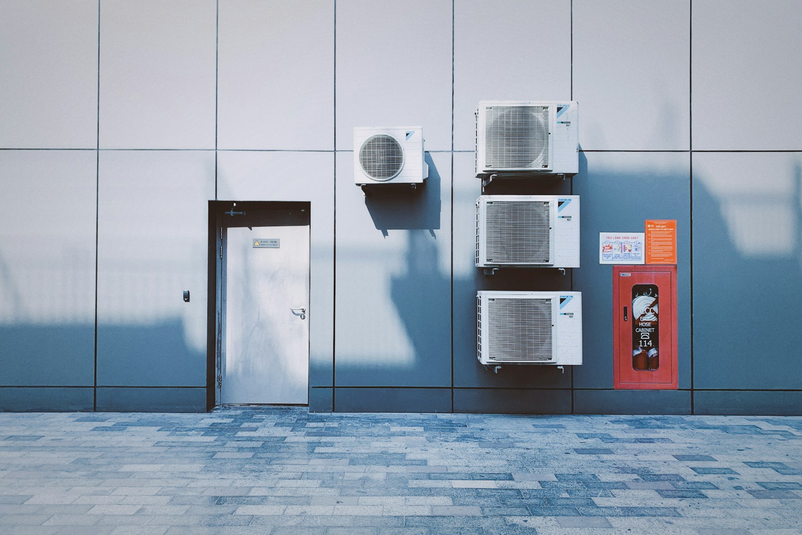 Air conditioning condenser units mounted on a building